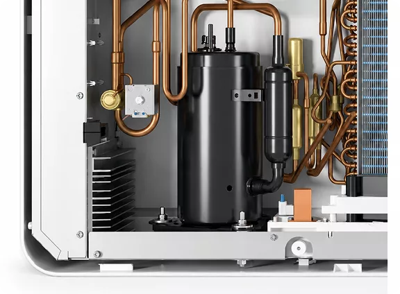 Compressor en leidingen in het binnenwerk van de flandriAir-warmtepomp