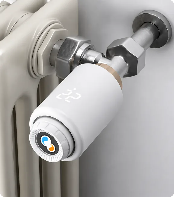 Draadloze radiatorknop op een radiatorkraan